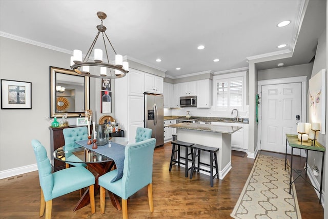 2500 N Seminary Ave Unit 4W, Chicago, IL 60614 - dining space featuring a chandelier, crown molding, recessed lighting, and dark wood-style floors