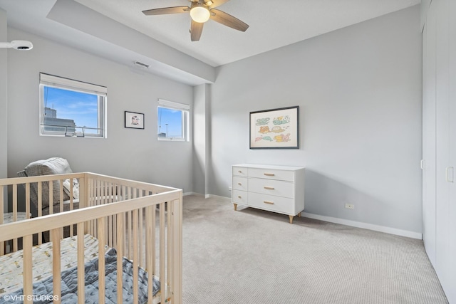 1035 W Huron St Unit 402, Chicago, IL 60642 - bedroom featuring light colored carpet, a nursery area, and a ceiling fan
