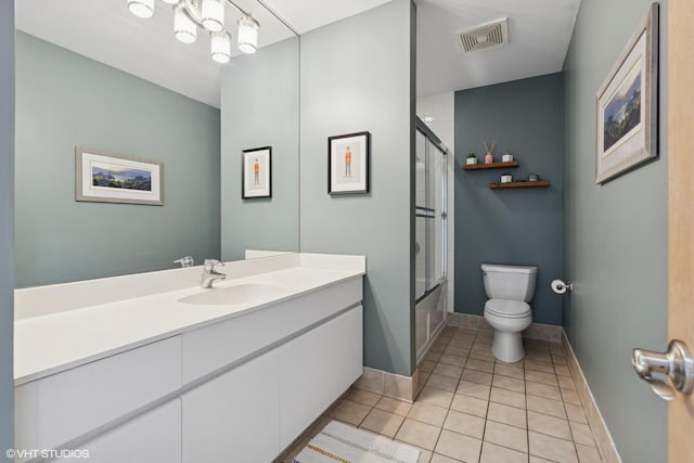 1035 W Huron St Unit 402, Chicago, IL 60642 - full bathroom featuring vanity, shower / bath combination with glass door, and tile patterned floors