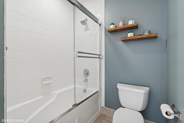 1035 W Huron St Unit 402, Chicago, IL 60642 - bathroom with enclosed tub / shower combo and tile patterned floors