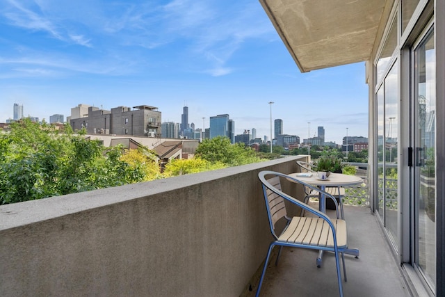 1035 W Huron St Unit 402, Chicago, IL 60642 - balcony featuring a view of skyline