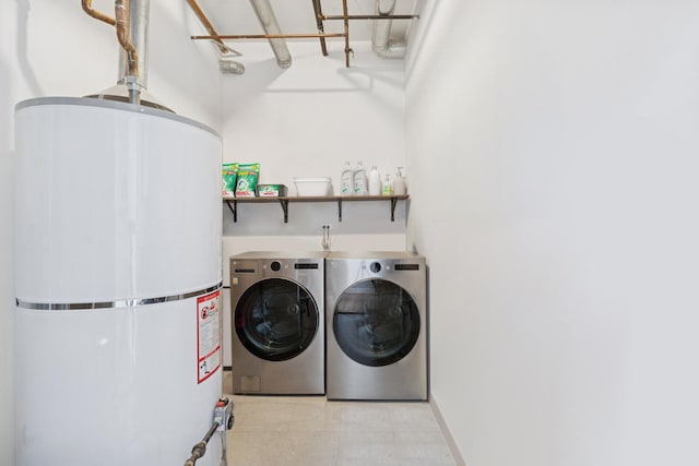 1035 W Huron St Unit 402, Chicago, IL 60642 - washroom featuring secured water heater and washing machine and clothes dryer