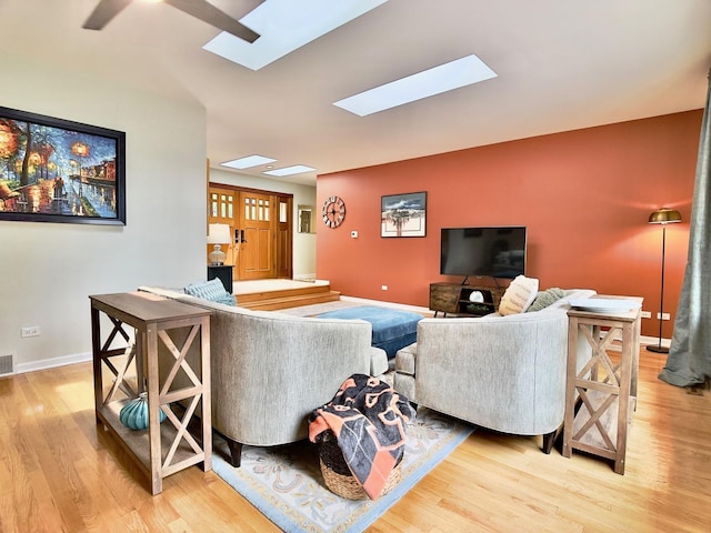 249 Jervey Ln, Bartlett, IL 60103 - living area with a skylight, light wood finished floors, and ceiling fan