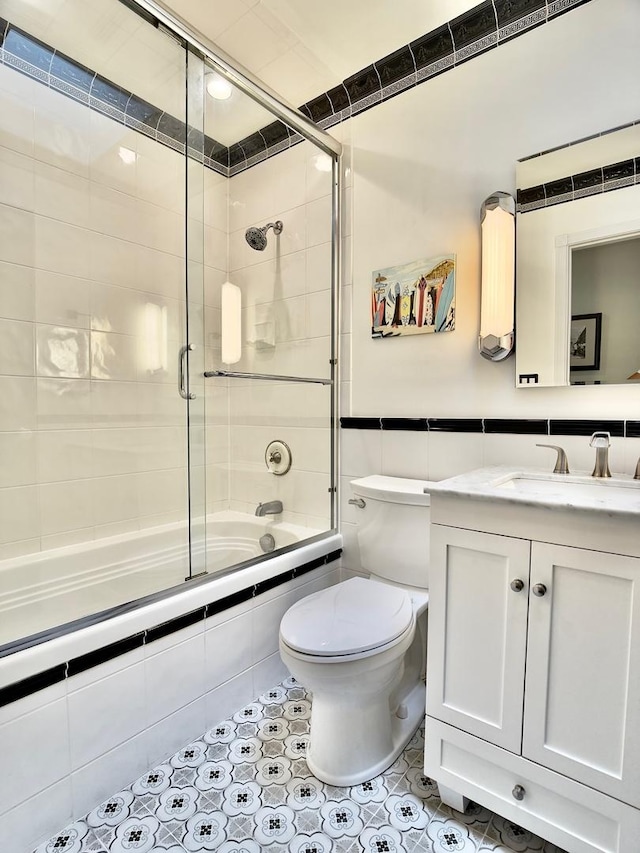 249 Jervey Ln, Bartlett, IL 60103 - full bath featuring tiled shower / bath, tile walls, and vanity