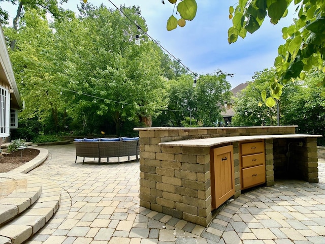 249 Jervey Ln, Bartlett, IL 60103 - view of patio / terrace featuring exterior kitchen and outdoor lounge area