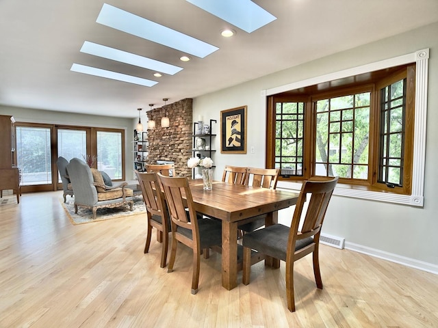 249 Jervey Ln, Bartlett, IL 60103 - dining space featuring a skylight, light wood finished floors, and recessed lighting