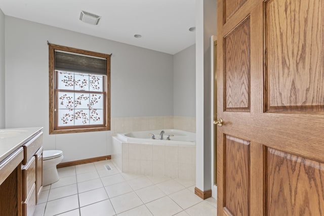 925 Magnolia Dr, Bourbonnais, IL 60914 - full bath with vanity, a garden tub, and tile patterned flooring