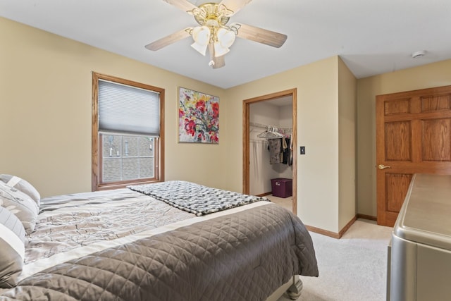 925 Magnolia Dr, Bourbonnais, IL 60914 - bedroom featuring light colored carpet, a ceiling fan, a walk in closet, and a closet