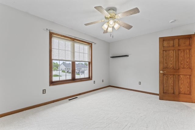 925 Magnolia Dr, Bourbonnais, IL 60914 - carpeted spare room featuring a smoke detector and a ceiling fan
