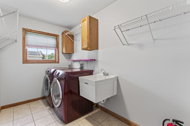 925 Magnolia Dr, Bourbonnais, IL 60914 - laundry area featuring cabinet space, independent washer and dryer, and light tile patterned floors