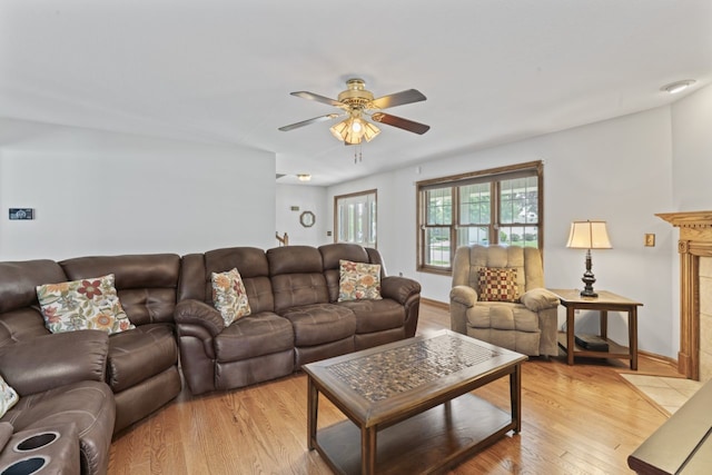 925 Magnolia Dr, Bourbonnais, IL 60914 - living area with a ceiling fan and light wood-style flooring