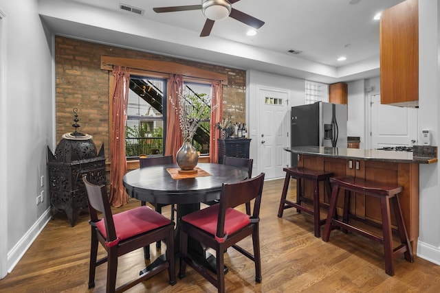 3316 W Byron St Unit 1, Chicago, IL 60618 - dining area with a ceiling fan, wood finished floors, a raised ceiling, and recessed lighting