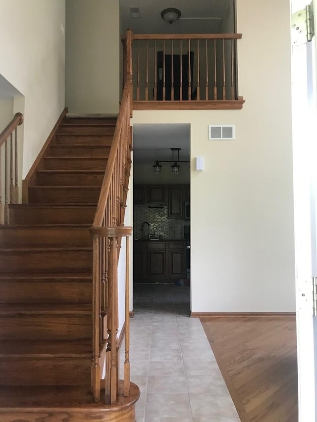 1317 Leonard Dr, Schaumburg, IL 60193 - stairs with tile patterned flooring