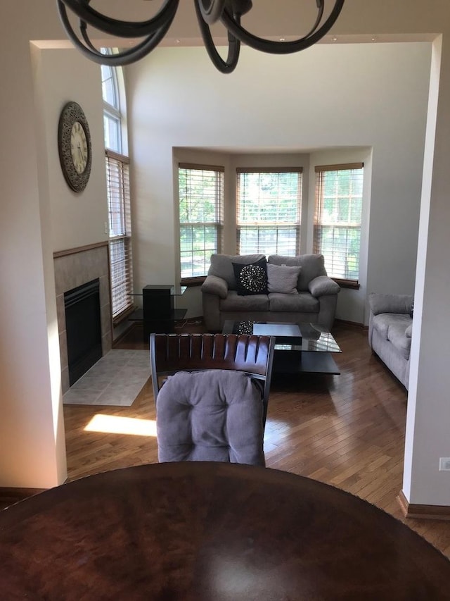 1317 Leonard Dr, Schaumburg, IL 60193 - living area with wood finished floors and a tiled fireplace