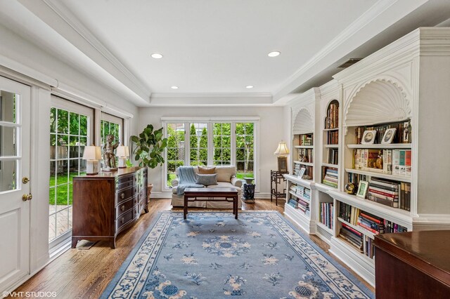 3233 Park Pl, Evanston, IL 60201 - office space featuring wood finished floors, a raised ceiling, crown molding, recessed lighting, and built in features