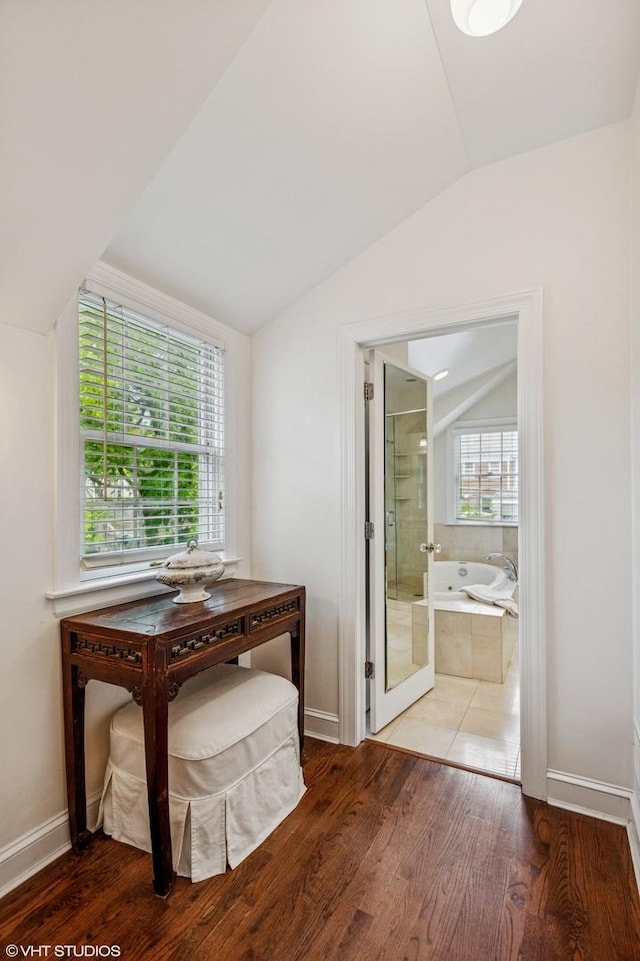 3233 Park Pl, Evanston, IL 60201 - dining space with lofted ceiling and wood finished floors