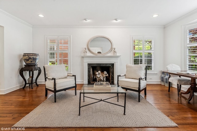 3233 Park Pl, Evanston, IL 60201 - sitting room featuring ornamental molding, wood finished floors, a premium fireplace, and recessed lighting