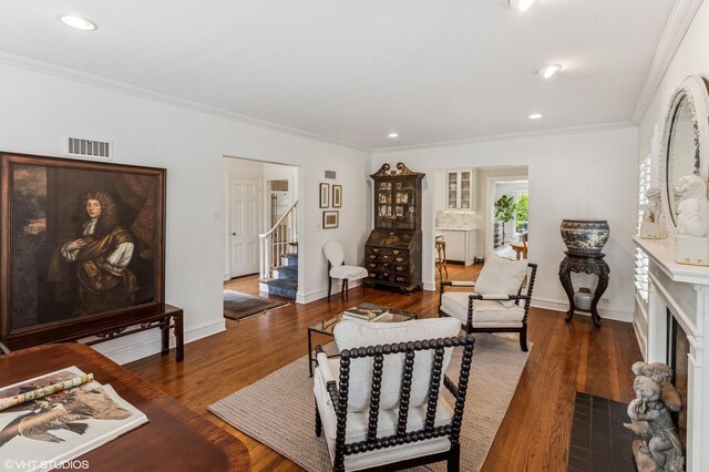3233 Park Pl, Evanston, IL 60201 - living area featuring stairs, wood finished floors, ornamental molding, a fireplace with flush hearth, and recessed lighting