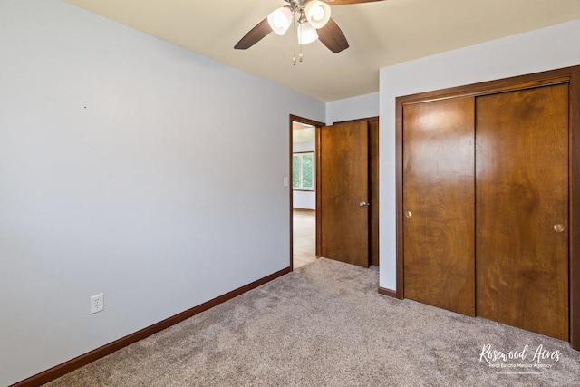 301 N Second St, Ashkum, IL 60911 - unfurnished bedroom with carpet flooring, a closet, and ceiling fan
