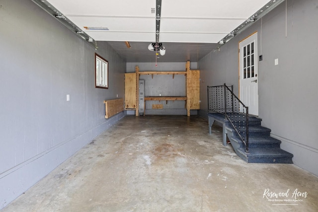 301 N Second St, Ashkum, IL 60911 - garage featuring a garage door opener