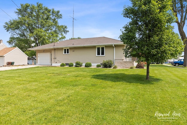 301 N Second St, Ashkum, IL 60911 - view of front of property featuring a garage, a front yard, and driveway