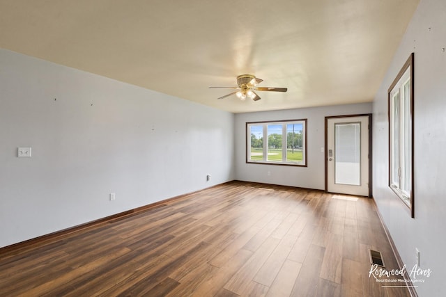 301 N Second St, Ashkum, IL 60911 - spare room featuring a ceiling fan and wood finished floors