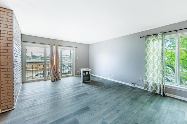 9516 S Kildare Ave Unit 2N, Oak Lawn, IL 60453 - spare room featuring wood finished floors and baseboards