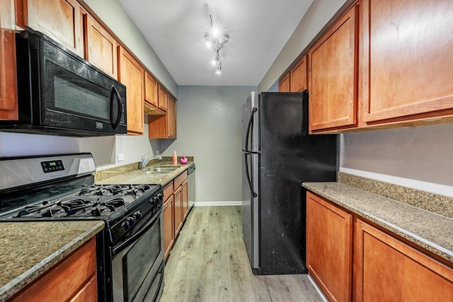 9516 S Kildare Ave Unit 2N, Oak Lawn, IL 60453 - kitchen featuring black appliances, light wood-style flooring, and brown cabinets