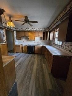 1406 Searle Dr, Normal, IL 61761 - kitchen featuring a ceiling fan, brown cabinetry, dark wood-style flooring, and light countertops