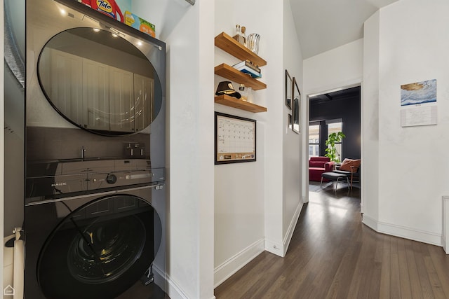 726 W Sheridan Rd Unit 3S, Chicago, IL 60613 - laundry room with estacked washer and dryer and dark wood-type flooring