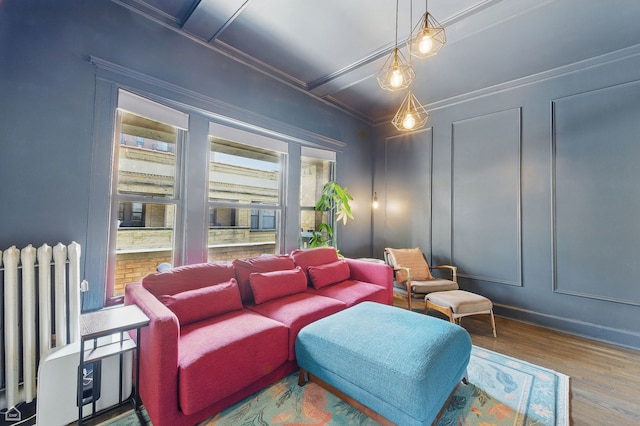 726 W Sheridan Rd Unit 3S, Chicago, IL 60613 - living area featuring radiator, wood finished floors, and ornamental molding