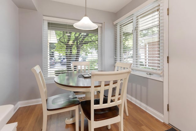 221 Pin Oak Dr, Wilmette, IL 60091 - dining area featuring wood finished floors and healthy amount of natural light