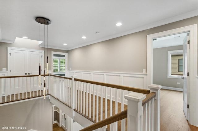 411 S Berkley Ave, Elmhurst, IL 60126 - hall with an upstairs landing, wood finished floors, wainscoting, recessed lighting, and a decorative wall