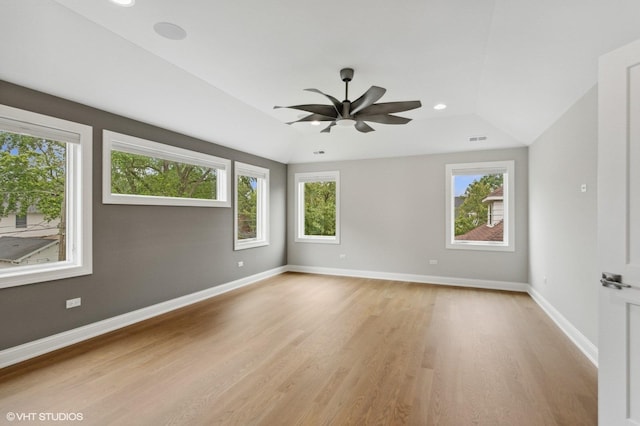 411 S Berkley Ave, Elmhurst, IL 60126 - spare room with light wood-type flooring, vaulted ceiling, ceiling fan, and recessed lighting