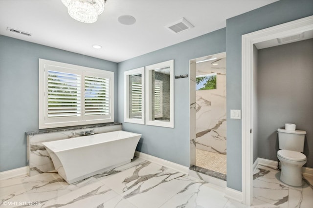 411 S Berkley Ave, Elmhurst, IL 60126 - full bath featuring marble finish flooring, a marble finish shower, a freestanding tub, healthy amount of natural light, and recessed lighting