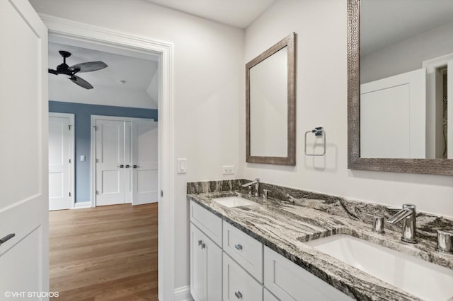 411 S Berkley Ave, Elmhurst, IL 60126 - bathroom with double vanity, wood finished floors, and a ceiling fan