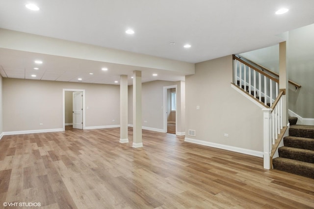 411 S Berkley Ave, Elmhurst, IL 60126 - unfurnished living room featuring light wood finished floors, stairway, and recessed lighting