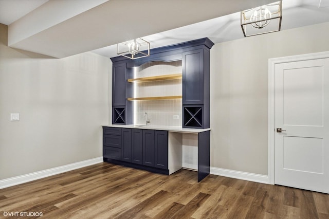 411 S Berkley Ave, Elmhurst, IL 60126 - bar with a chandelier and wood finished floors