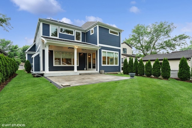 411 S Berkley Ave, Elmhurst, IL 60126 - rear view of house featuring a patio and a yard