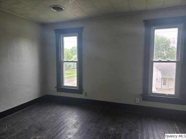 200 S Gillham, West Point, IL 62380 - spare room with dark wood finished floors