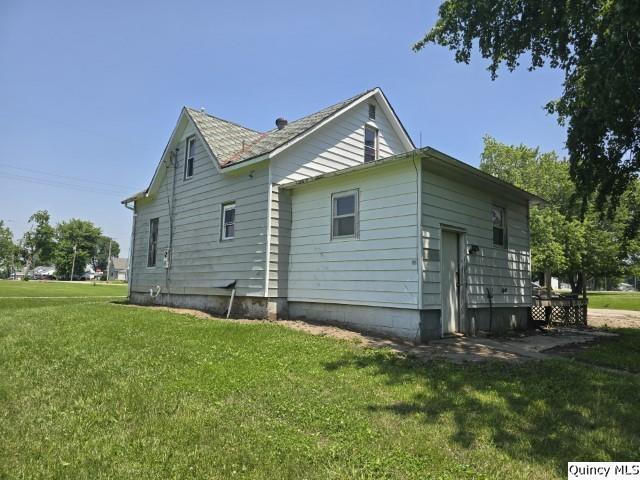 200 S Gillham, West Point, IL 62380 - view of property exterior featuring a lawn