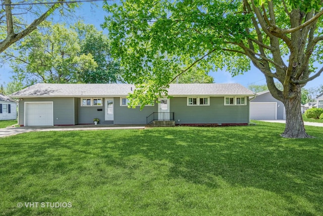 812 S Center St, Plano, IL 60545 - ranch-style house featuring a front lawn, an attached garage, a shingled roof, and a detached garage