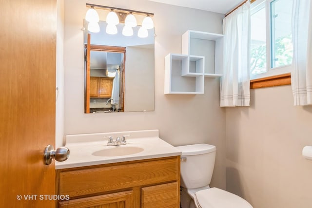 812 S Center St, Plano, IL 60545 - half bathroom with toilet and vanity
