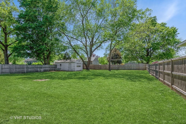 812 S Center St, Plano, IL 60545 - fenced backyard featuring a storage unit