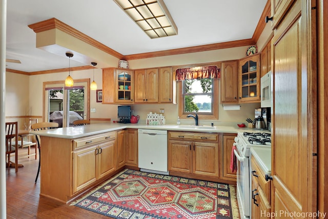 27892 W Bayview Dr, Ingleside, IL 60041 - kitchen featuring white appliances, a peninsula, light countertops, glass insert cabinets, and ornamental molding