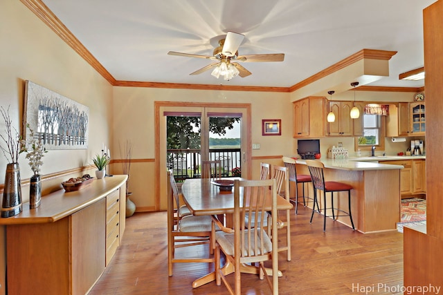 27892 W Bayview Dr, Ingleside, IL 60041 - dining room featuring ceiling fan, light wood-style floors, and crown molding