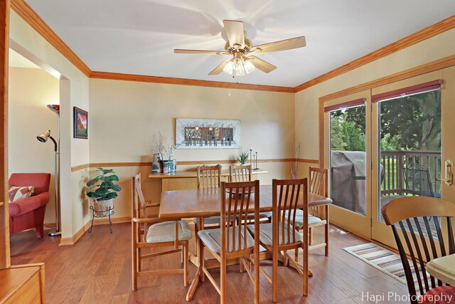27892 W Bayview Dr, Ingleside, IL 60041 - dining area with a ceiling fan, wood finished floors, and ornamental molding