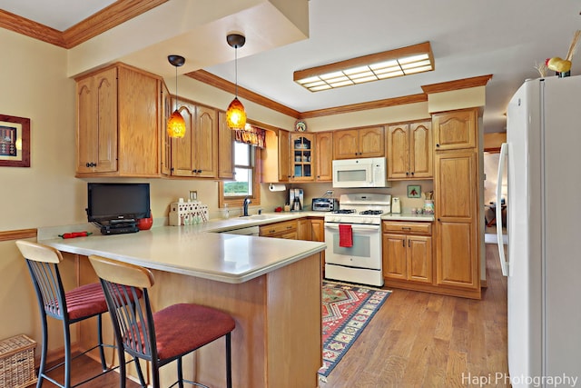 27892 W Bayview Dr, Ingleside, IL 60041 - kitchen featuring white appliances, a peninsula, light wood-style floors, crown molding, and glass insert cabinets