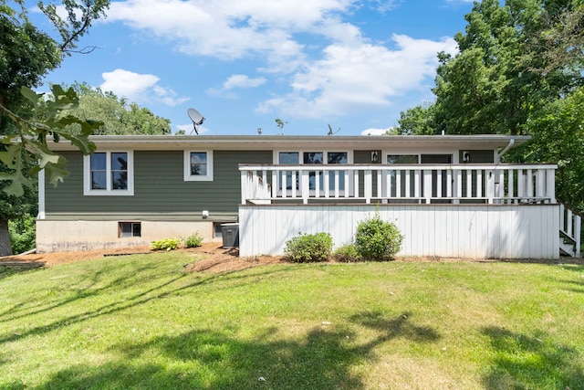43 Coffman Ln, Plano, IL 60545 - rear view of property with a lawn and a wooden deck