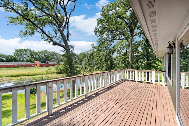43 Coffman Ln, Plano, IL 60545 - wooden terrace with a water view and a yard
